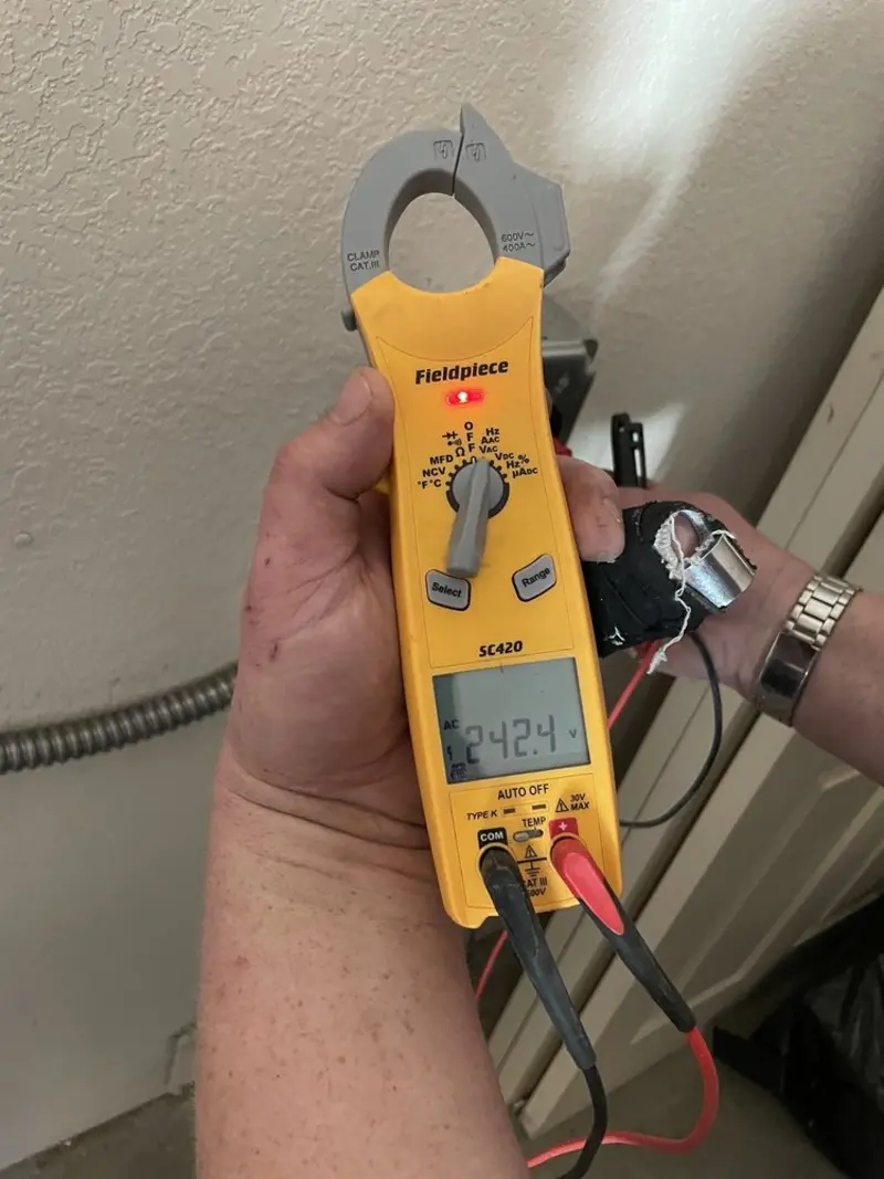 Voltage testing with clamp meter during Generator Installation in Elkhorn